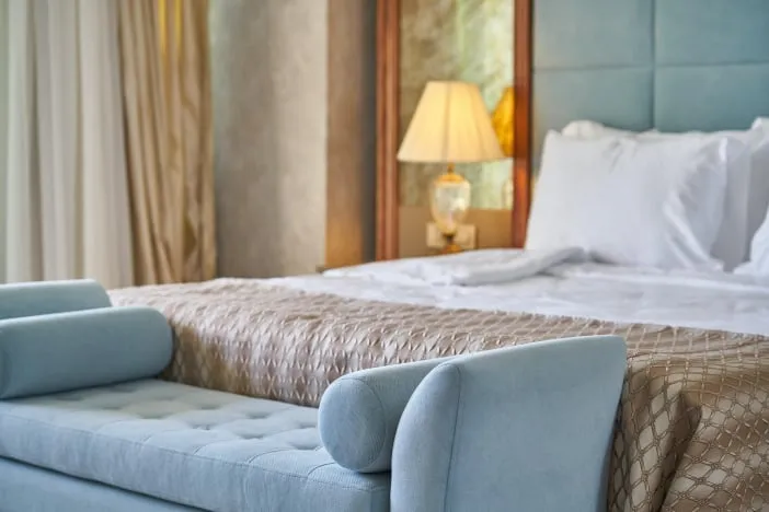 Bright luxury guest room with modern furnishings