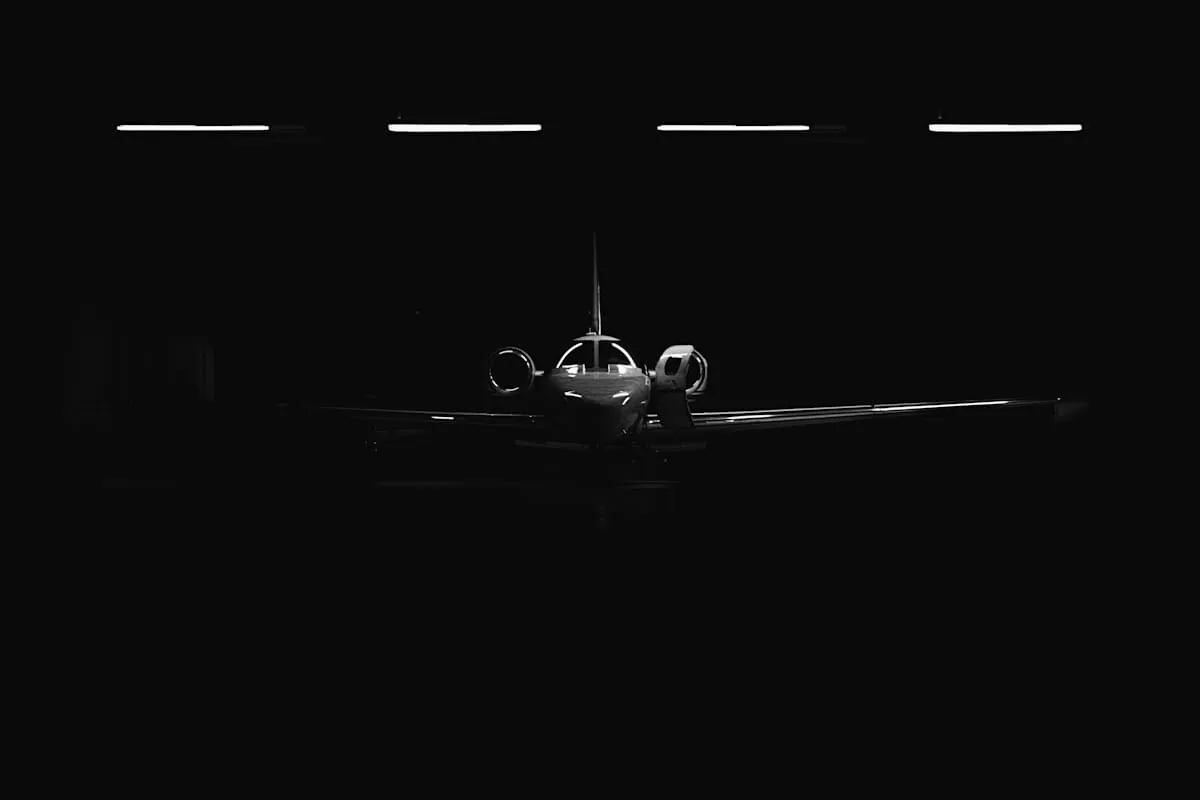 Private aircraft silhouette representing premium travel