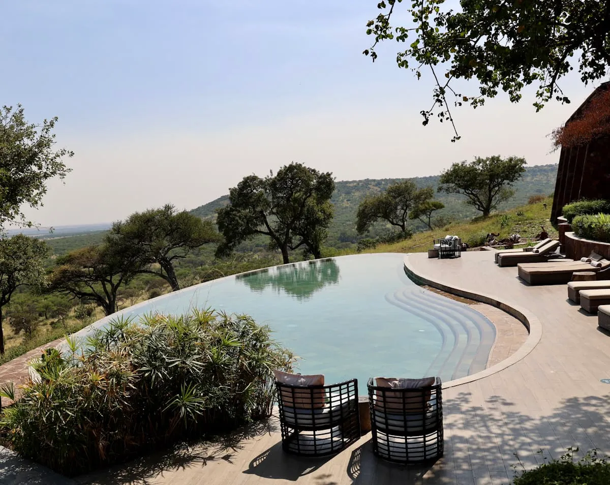Outdoor pool and landscaped resort grounds